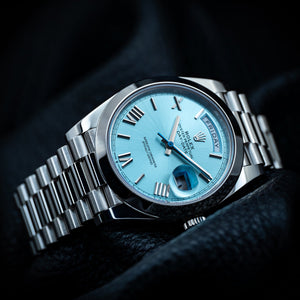 Rolex Day-Date 40 228206 Ice Blue Roman Dial Platinum Smooth Bezel