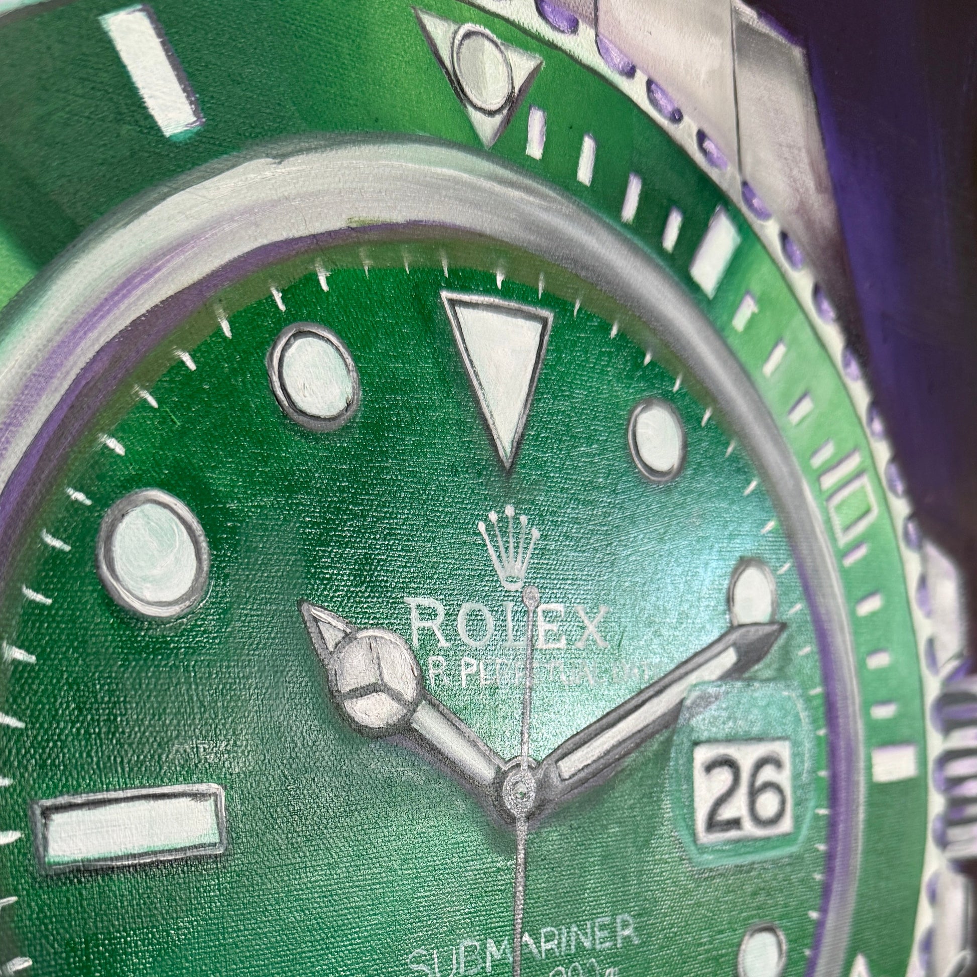 Close-up of a green Rolex watch with silver accents