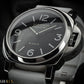 Luminor Panerai watch with black dial and silver case on a dark background