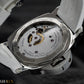 Close-up of a Panerai watch with visible brand name on a dark background